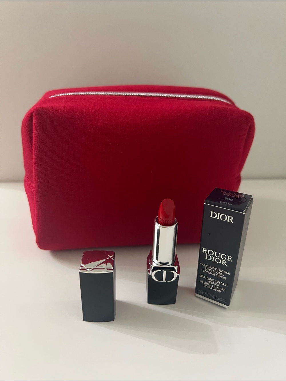 Dior New makeup bag + mini lipstick sample.